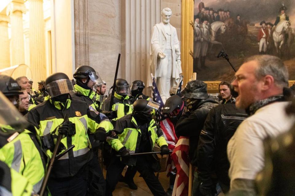 Police intervenes in US President Donald Trumps supporters who breached security and entered the Capitol building in Washington D.C., United States on January 06, 2021. (Mostafa Bassim/Anadolu Agency via Getty Images)