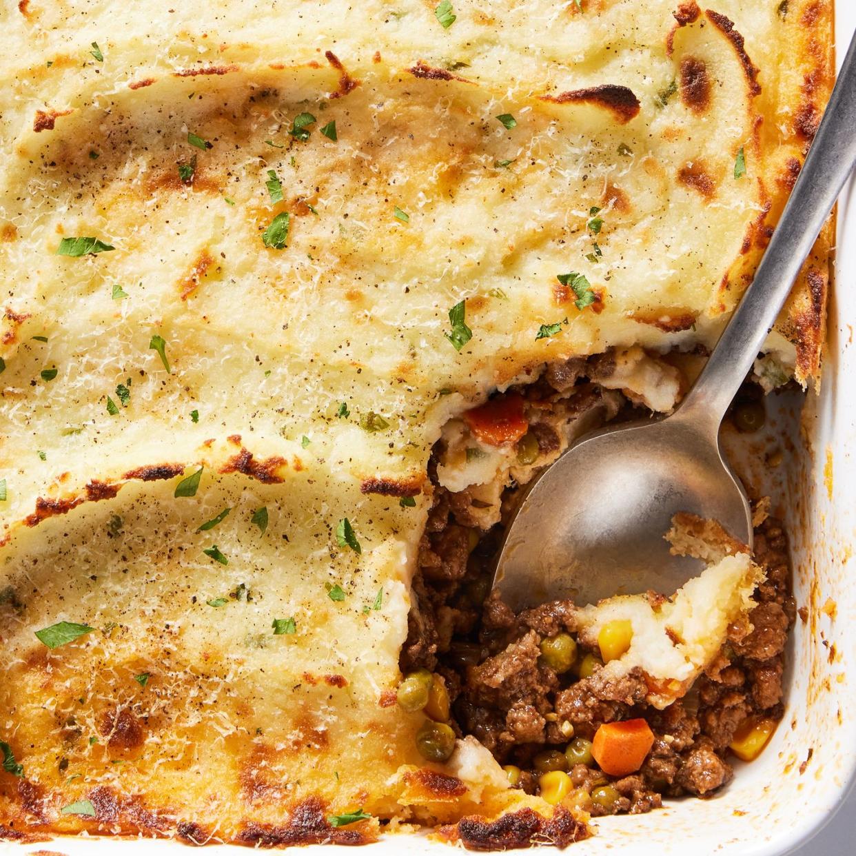 ground beef cooked with aromatics and red wine, then combined with corn and peas and covered with a blanket of velvety, rich mashed potatoes, then topped with parmesan and broiled until golden brown