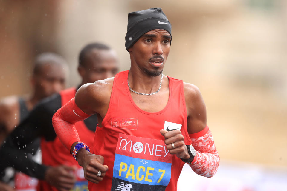 Mo Farah of Great Britain runs as a pacer during the Elite Men’s race during the 2020 Virgin Money London Marathon around St. James's Park on October 04, 2020 in London, England. (Photo by Adam Davy - Pool/Getty images)