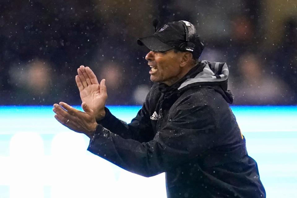 Arizona State coach Herm Edwards applauds the team during the second half of an NCAA college football game against Washington on Saturday, Nov. 13, 2021, in Seattle. Arizona State won 35-30.