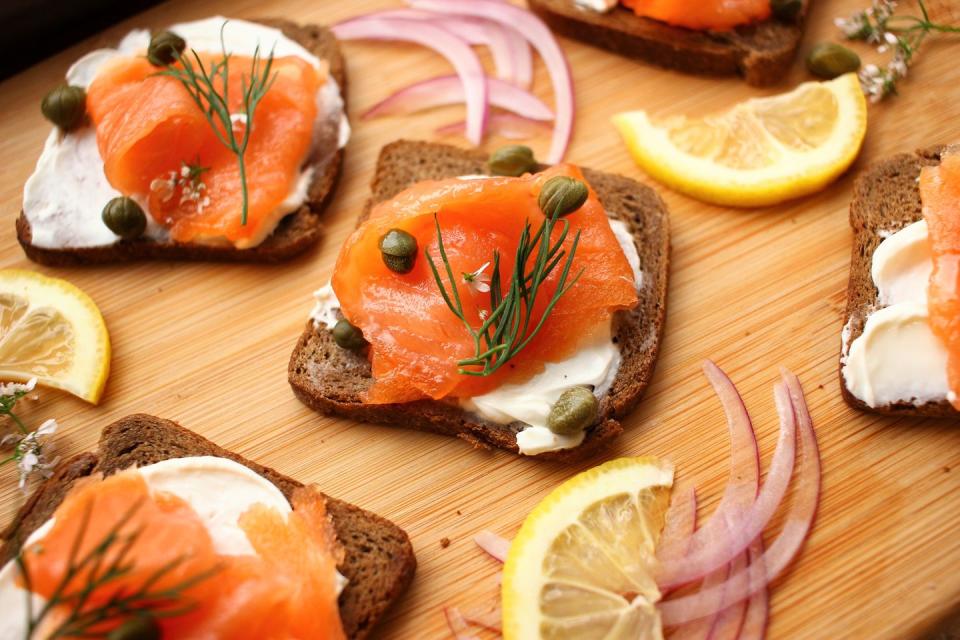 <p>Derived from the Yiddish word for <a href="https://www.delish.com/cooking/g2039/salmon-recipes/" rel="nofollow noopener" target="_blank" data-ylk="slk:salmon;elm:context_link;itc:0;sec:content-canvas" class="link ">salmon</a>, lox is cured salmon. Our version below is more akin to gravlax, which is a Nordic variation that includes dill and juniper alongside the basic salt and sugar cure. Pair it with cream cheese on a <a href="https://www.delish.com/cooking/recipe-ideas/a39456710/bagel-and-lox-recipe/" rel="nofollow noopener" target="_blank" data-ylk="slk:bagel and lox;elm:context_link;itc:0;sec:content-canvas" class="link ">bagel and lox</a> for the <em>perfect</em> breakfast.</p><p>Get the <strong><a href="https://www.delish.com/cooking/recipe-ideas/a33446892/lox-recipe/" rel="nofollow noopener" target="_blank" data-ylk="slk:Lox recipe;elm:context_link;itc:0;sec:content-canvas" class="link ">Lox recipe</a></strong>.</p>