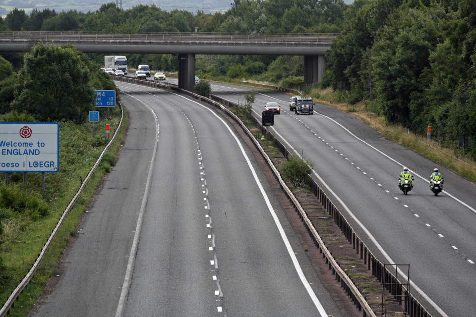 Police escort vehicles along the M4 motorway during the morning rush hour as drivers hold a go-slow protest on the M4. Police have warned of 