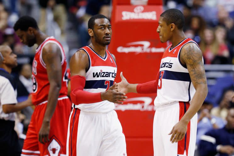 John Wall and Bradley Beal feel the love. (Rob Carr/Getty Images)