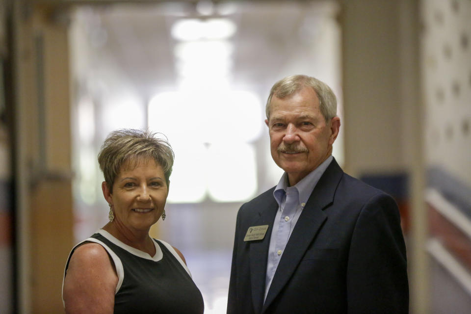 Superintendent Denia Reese, left, and school board Chairman Don Dycus, right, pose for a portrait on Thursday, May 28, 2020, in Fort Oglethorpe, Ga. With sharp declines in state spending projected because of the economic fallout from the COVID-19 pandemic, America's more than 13,000 local school systems are wrestling with the likelihood of big budget cuts. (AP Photo/Brynn Anderson)