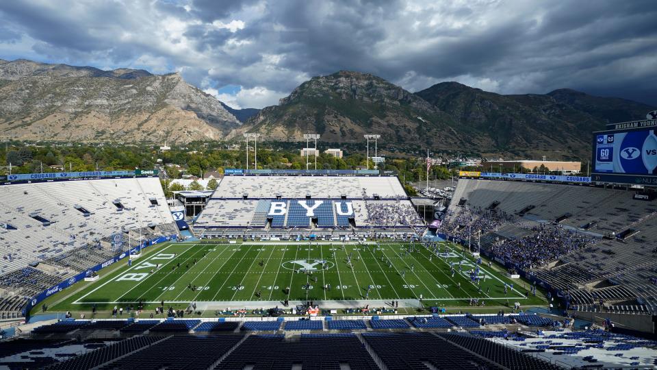 Players get ready for an NCAA college football game between Utah State and BYU on Thursday, Sept. 29, 2022, at LaVell Edwards Stadium in Provo, Utah. (AP Photo/Rick Bowmer)