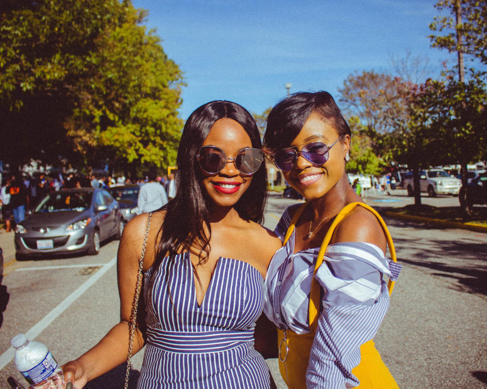 Two women strike a pose during Hampton University’s 2017 homecoming tailgate party. (Photo: J. Collier/Curry St. Shots)
