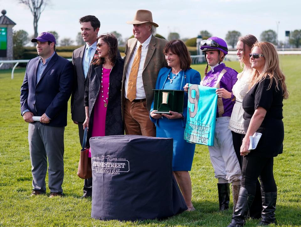 The winners circle at Keeneland following the Stonestreet Lexington Stakes won by Tawny Port, trained by Brad Cox, left.