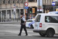 <p>A police officer walks outside Central Station after a reported explosion in Brussels on Tuesday, June 20, 2017. Belgian media are reporting that explosion-like noises have been heard at a Brussels train station, prompting the evacuation of a main square. (AP Photo/Geert Vanden Wijngaert) </p>