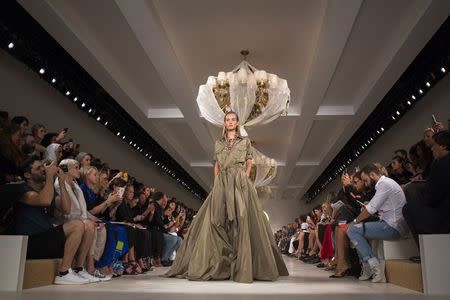 A model presents a creation from the Ralph Lauren Spring/Summer 2015 collection during New York Fashion Week September 11, 2014. REUTERS/Lucas Jackson