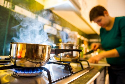 <span class="caption">A gas stove can expose you to harmful indoor air pollution.</span> <span class="attribution"><a class="link " href="https://www.shutterstock.com/image-photo/woman-preparing-food-kitchen-518576872" rel="nofollow noopener" target="_blank" data-ylk="slk:Goodbishop/Shutterstock;elm:context_link;itc:0;sec:content-canvas">Goodbishop/Shutterstock</a></span>