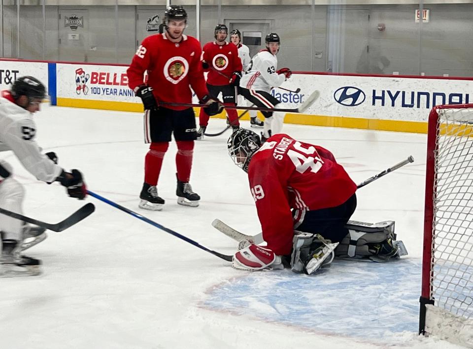 Jaxson Stauber makes a stop during the Blackhawks' prospect camp in Chicago on Tuesday, July 12, 2022. Stauber is in the running to be a goalie for the Rockford IceHogs next season.