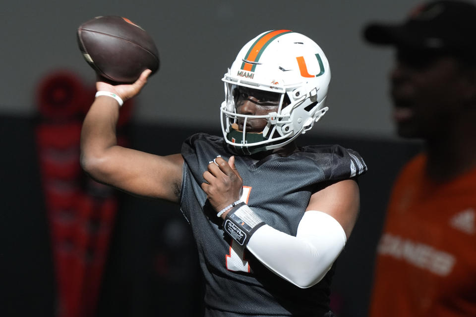 Hopes are high in Coral Gables this season after quarterback Cam Ward transferred to Miami from Washington State. (AP Photo/Marta Lavandier, File)