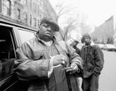 <p>The Notorious B.I.G. outside his mother's house in in January 1995.</p>