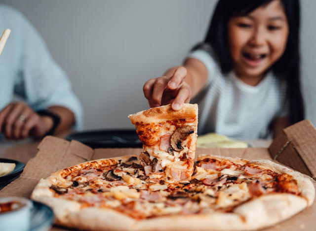 One Major Side Effect of Reheating Frozen Foods, Says Science