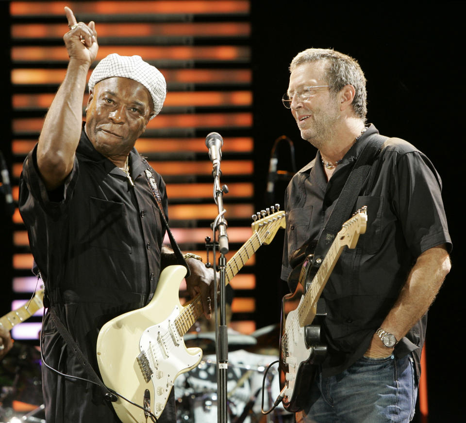 Buddy Guy, left, prompts the crowd as he and Eric Clapton perform “Sweet Home Chicago” at the Crossroads Guitar Festival in Chicago, Saturday, July 28, 2007. - Credit: AP