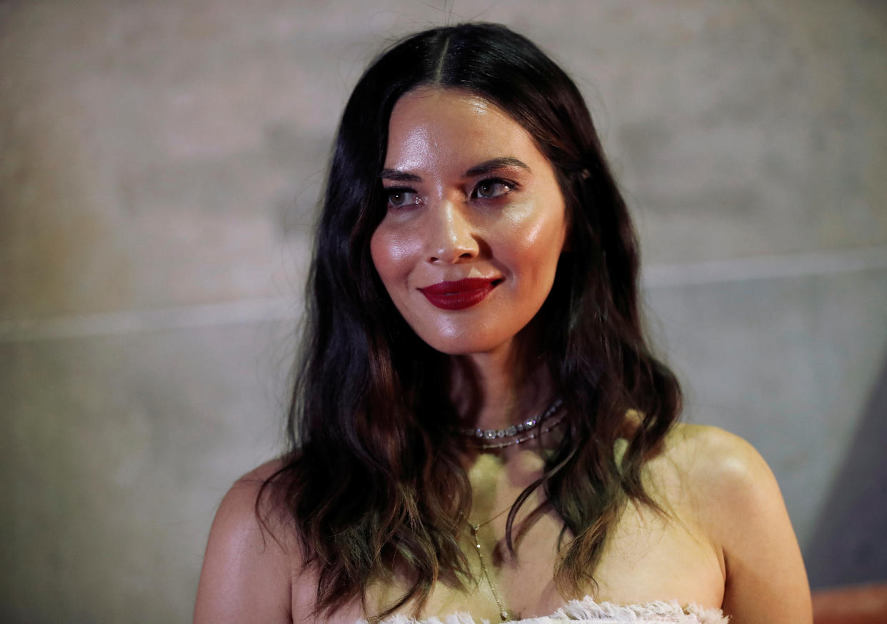 New mom Olivia Munn cuddles with 2-month-old son Malcolm in a new selfie. (Photo: REUTERS/Mario Anzuoni)