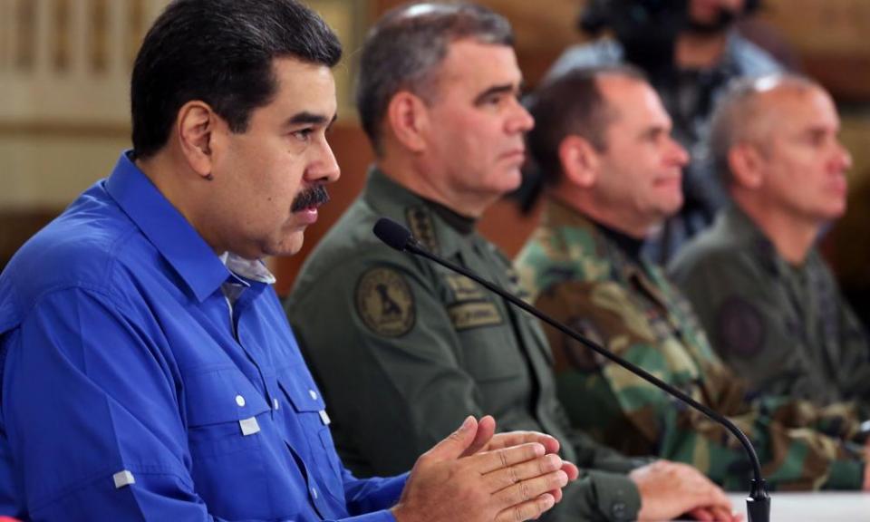 Venezuela’s president Nicolas Maduro at the Miraflores palace next to defence minister Vladimir Padrino in Caracas, on Tuesday.