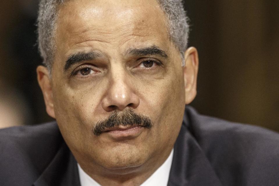 Attorney General Eric Holder testifies on Capitol Hill in Washington, Wednesday, Jan. 29, 2014, before the Senate Judiciary Committee hearing oversight hearing on the Justice Department. As attorney general, Holder has approved pursuing the death penalty in at least 34 criminal cases, upholding a long-ago pledge to Congress that he would vigorously enforce federal law even though he’s not a proponent of capital punishment. (AP Photo/J. Scott Applewhite)