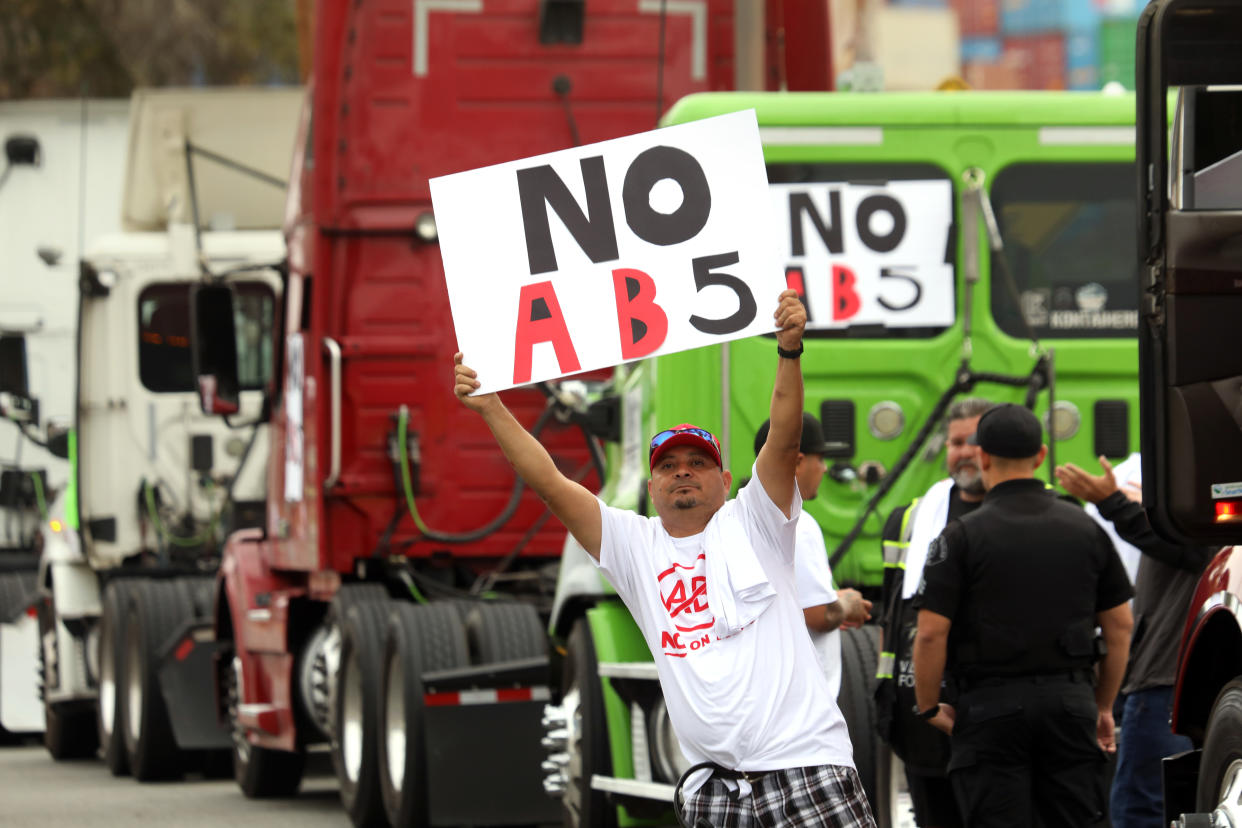 Truckers hold a demonstration in the Port of Los Angeles on July 13, 2022 to protest California's Assembly Bill 5 (AB5) worker classification law. (Carolyn Cole/Los Angeles Times via Getty)