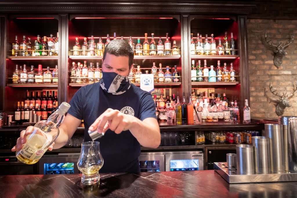 Covid restrictions will remain in place in Scottish pubs and restaurants (Jane Barlow/PA) (PA Archive)