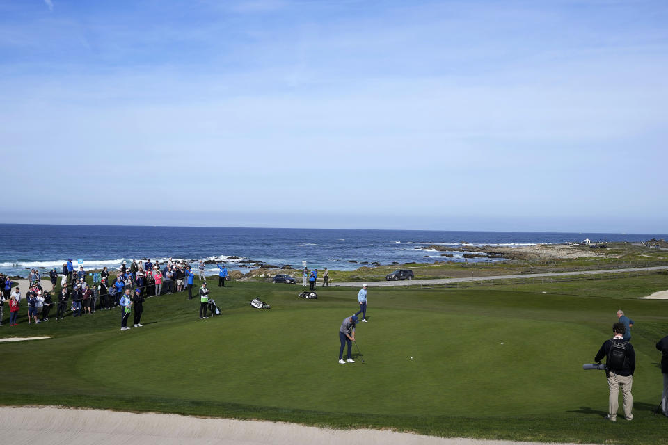Seamus Power putts on the 12th green of the Monterey Peninsula Country Club Shore Course during the third round of the AT&T Pebble Beach Pro-Am golf tournament in Pebble Beach, Calif., Saturday, Feb. 5, 2022. (AP Photo/Tony Avelar)