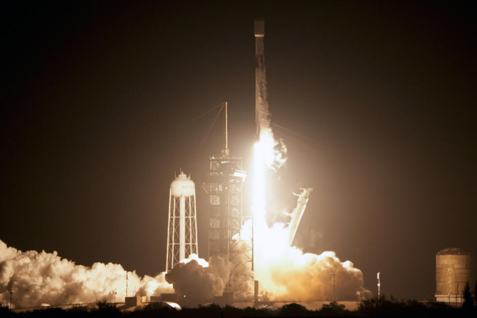 A SpaceX Falcon 9 rocket lifts off from pad 39A at Kennedy Space Center in Cape Canaveral, Fla., early Thursday, Feb. 15, 2024. The rocket is carrying Intuitive Machines’ lunar lander on its way to the moon. If all goes well, a touchdown attempt would occur Feb. 22, after a day in lunar orbit. (AP Photo/John Raoux)