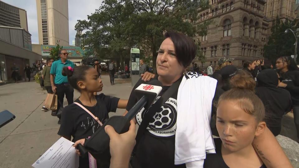 Evelyn Fox says she lost her son to gun violence in 2016 when he was struck by a stray bullet outside a Toronto night club. She said she was out Saturday for her son and for the children of other parents who lost their children to gun violence.