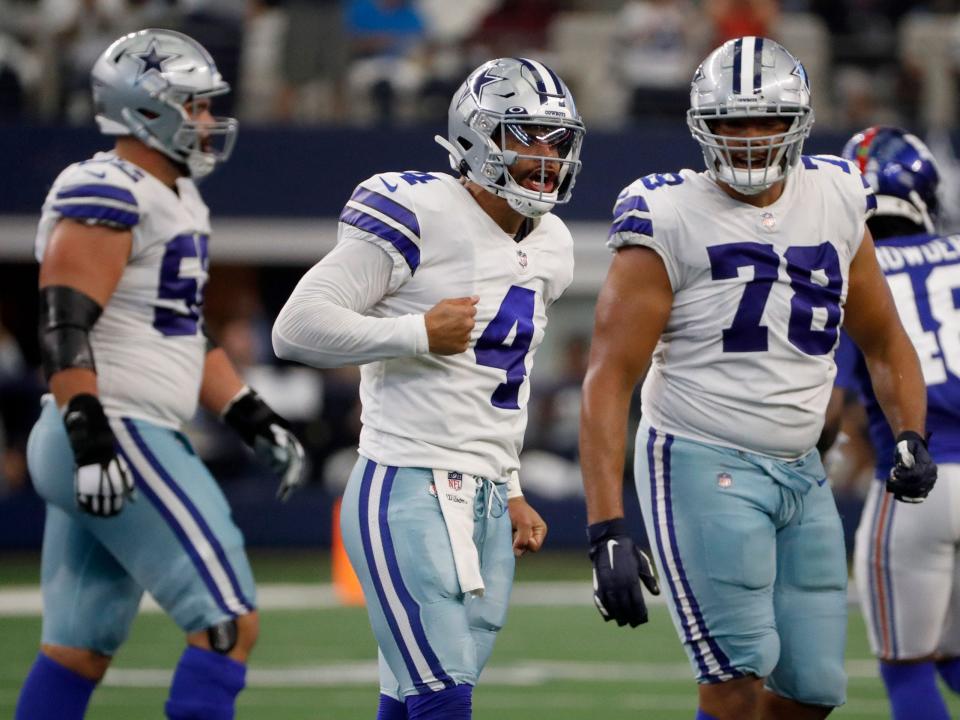 Dak Prescott reacts after a touchdown pass against the New York Giants.