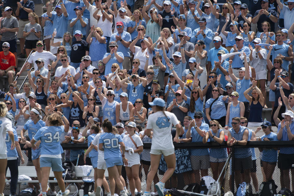 Fans of North Carolina cheer on the team during the NCAA college Division 1 women's lacrosse championship against Boston College in Baltimore, Sunday, May 29, 2022. (Vincent Alban/The Baltimore Sun via AP)