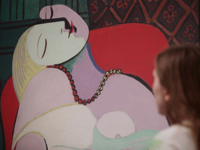 A woman looking at Pablo Picasso&#x002019;s The Dream (Yui Mok/PA)