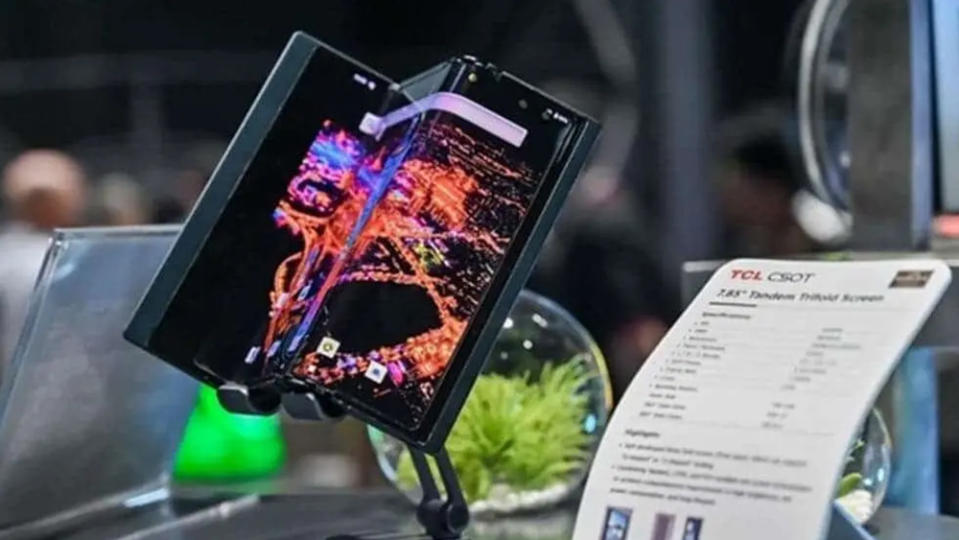 TCL tri-fold phone on a desk