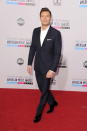 Ryan Seacrest arrives on the 2012 American Music Awards red carpet.