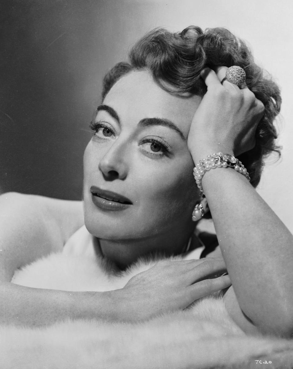 1952: Draped in jewels for a promotional shoot