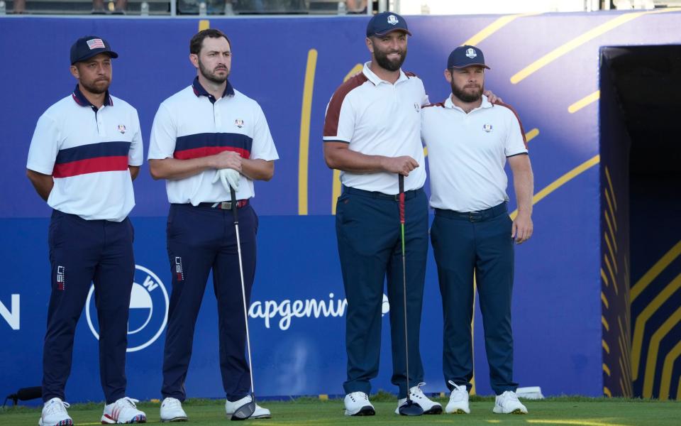 United States' Xander Schauffele, left, with playing partner United States' Patrick Cantlay