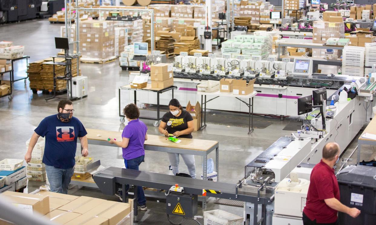 <span>Election workers in 2020 in Phoenix, Arizona. </span><span>Photograph: Bloomberg/Getty Images</span>