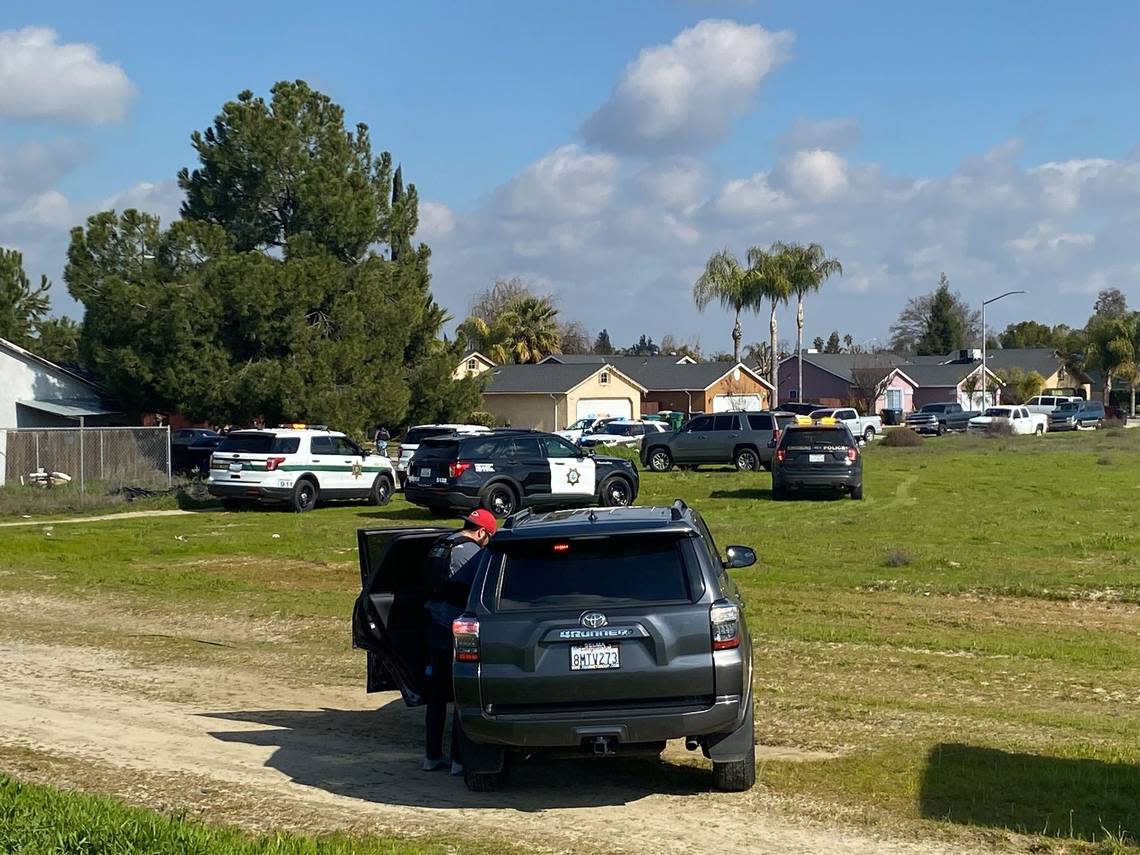 Law enforcement vehicles can be seen near the location of a reported shooting in Selma, California, on Tuesday, Jan. 31, 2023.