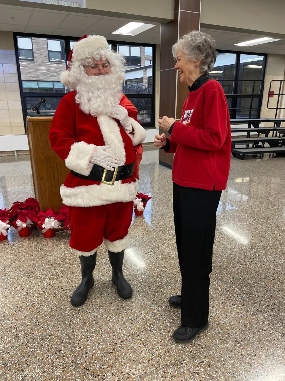 Santa (National Honor Society member Noah Zimmerman) greets Marty Brown at the Port Clinton High School’s Holiday Breakfast with the Arts. Local residents enjoyed breakfast and a morning concert which has become a holiday tradition at Port Clinton High School.