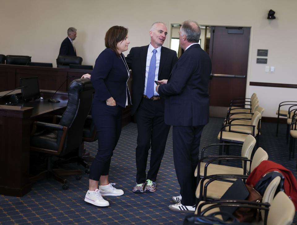 Catherine Raney Norman, chairwoman of the Salt Lake City-Utah Committee for the Games, Darren Hughes, the committee’s bid lead, and Colin Hilton, CEO of the Utah Olympic Legacy Foundation, confer following the first meeting of Utah Legislature’s Olympic Coordination Committee at the Capitol in Salt Lake City on Thursday, June 15, 2023. | Laura Seitz, Deseret News
