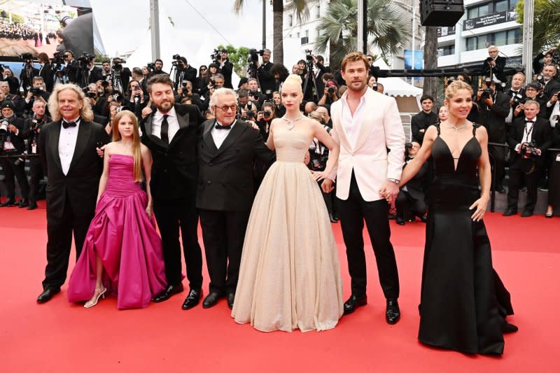 Doug Mitchell, Alyla Browne, Tom Burke, George Miller, Anya Taylor-Joy, Chris Hemsworth and Elsa Pataky, from left to right, attend the Cannes Film Festival premiere of "Furiosa: A Mad Max Saga" on Wednesday. Photo by Rune Hellestad/UPI