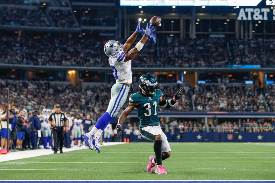 Dallas Cowboys wide receiver Amari Cooper (19) makes a catch over Philadelphia Eagles cornerback Jalen Mills (31), though it was called back due to a penalty. (Getty Images)