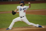 Los Angeles Dodgers starting pitcher Clayton Kershaw throws against the Tampa Bay Rays during the first inning in Game 1 of the baseball World Series Tuesday, Oct. 20, 2020, in Arlington, Texas. (AP Photo/Eric Gay)