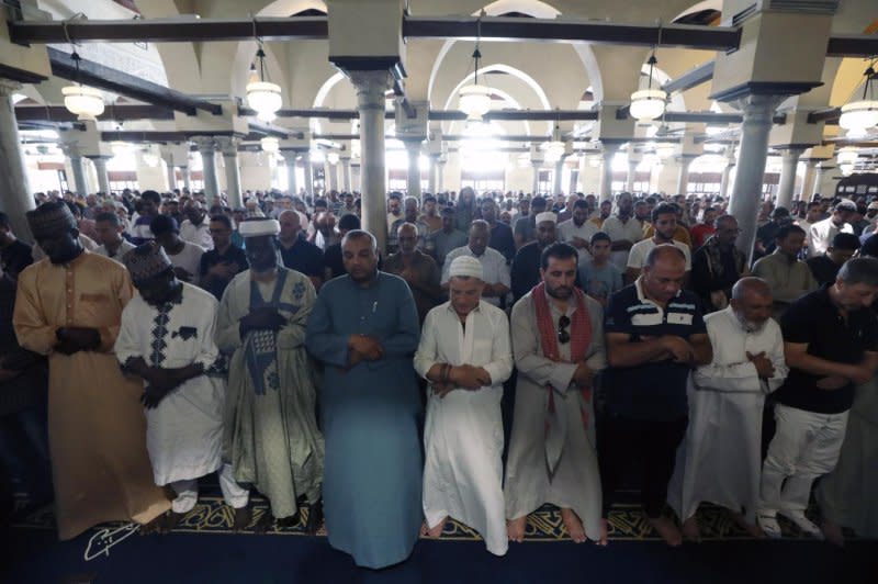 Muslims in Cairo pray for the victims of the earthquake in Morocco and the flooding in Libya during a mass prayer at the Al-azhar mosque in Cairo on Friday. At least 11,300 people are dead from the Libyan floods, according to the Libyan Red Crescent. Photo by Khaled Elfiqi/EPA-EFE
