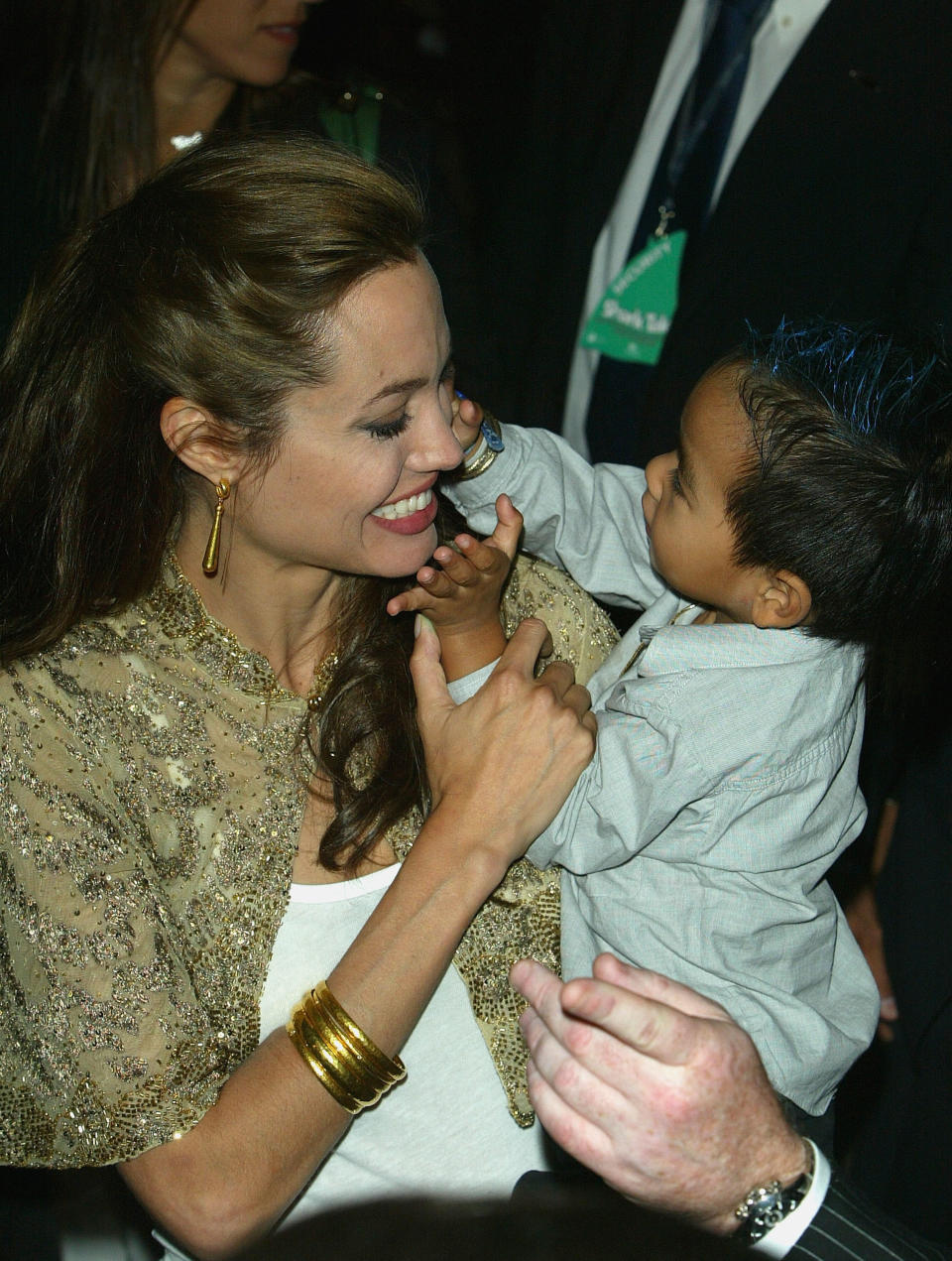 VENICE, ITALY - SEPTEMBER 10:  Actress Angelina Jolie and her son Maddox attend the World Premiere of "Shark Tale" in San Marco Square, as part of the 61st Venice Film Festival on September 10, 2004 in Venice, Italy. (Photo by Pascal Le Segretain/Getty Images)