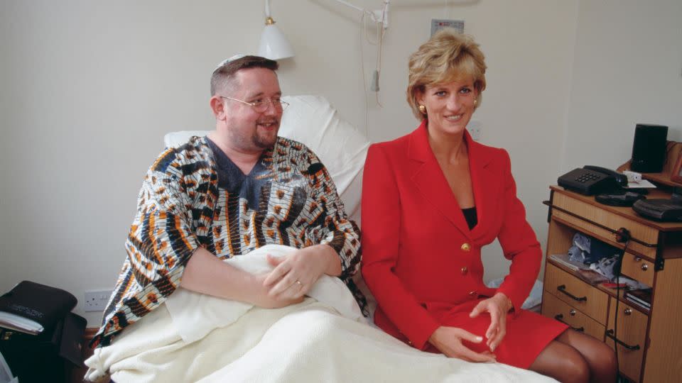 Princess Diana wearing a red Catherine Walker suit during a 1996 visit to a center for people affected by HIV and AIDS.  - Princess Diana Archive/Hulton Royals Collection/Getty Images