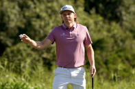 Cameron Smith waves after winning the final round of the Tournament of Champions golf event, Sunday, Jan. 9, 2022, at Kapalua Plantation Course in Kapalua, Hawaii. (AP Photo/Matt York)