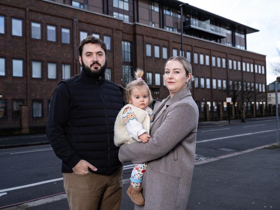 Rob Jenkins with his baby Maeve and partner Katie James (Daniel Hambury/Stella Pictures Ltd)