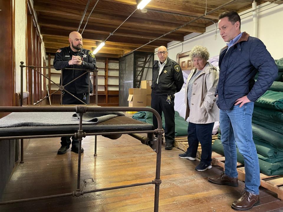 Members of the Fall River Historical Society went to New Bedford's Ash Street Jail to examine a historic bed that may have been the one Lizzie Borden slept on while she was imprisoned.