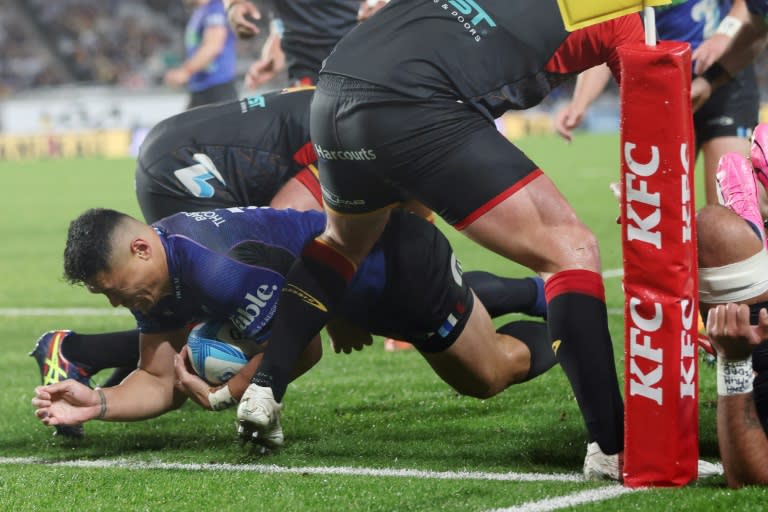 Caleb Clarke of the Blues scores a try during the Super Rugby final (MICHAEL BRADLEY)