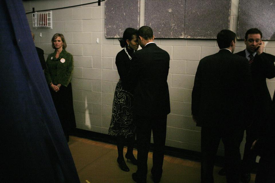 Then-Sen. Barack Obama and his wife Michelle Obama backstage before going out to face their supporters at a primary night rally in the gymnasium at the Nashua South High School on Jan. 8, 2008 in Nashua, New Hampshire.