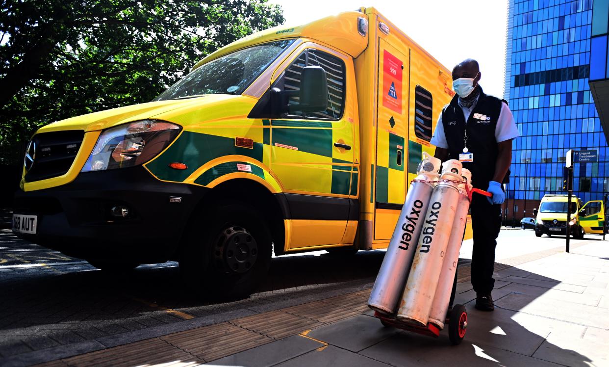 Oxygen tanks outside the Royal London Hospital on Friday (EPA)